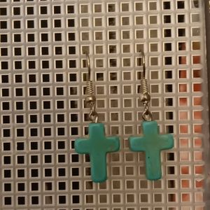 Turquoise cross earrings.